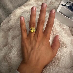 Emerald cut yellow ring